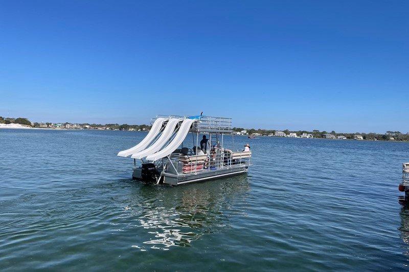 triple slide party boat from rowdy boats rear view