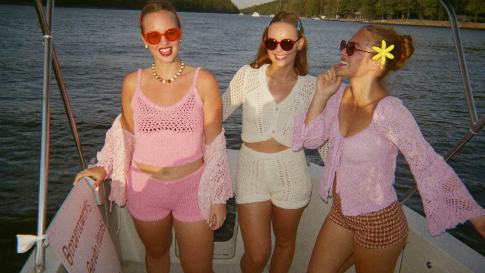 Seventies groovy bachelorette outfits with crochet and tinted sunglasses at golden hour - Dazed and Engaged theme